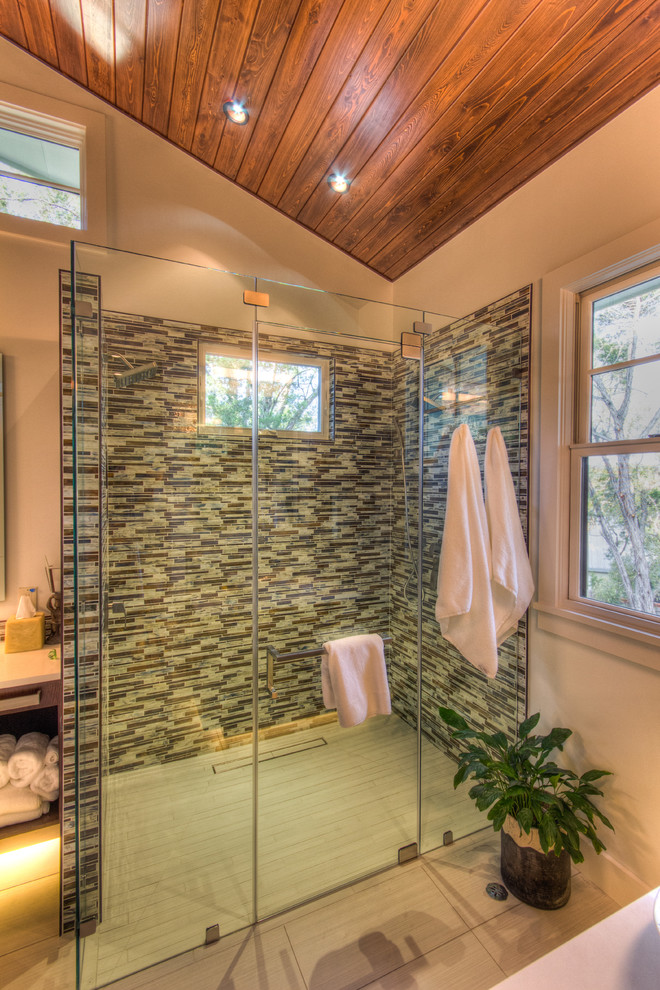 Design ideas for a large eclectic master bathroom in Austin with green tile, white walls, porcelain floors, a corner shower, glass tile, white floor and a hinged shower door.
