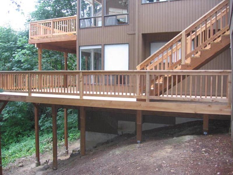 Deck - mid-sized backyard balcony deck idea in Seattle with no cover