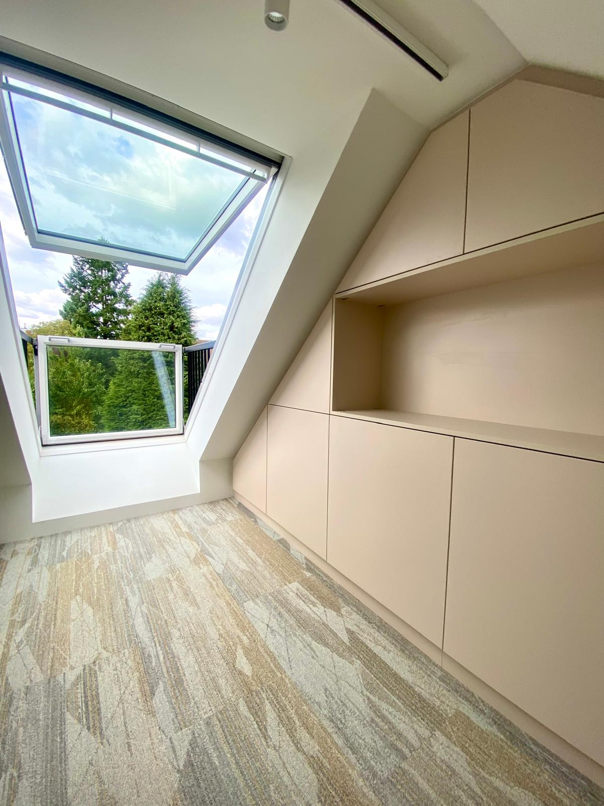 Dachumbau mit Wendeltreppe