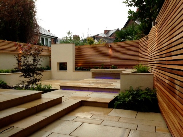 Design ideas for a small contemporary backyard garden in London.