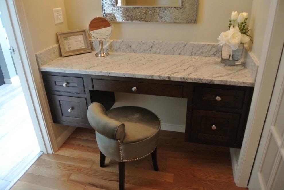 Example of a transitional master porcelain tile and beige floor alcove shower design in Boston with shaker cabinets, dark wood cabinets, a one-piece toilet, gray walls, an undermount sink, granite countertops and gray countertops