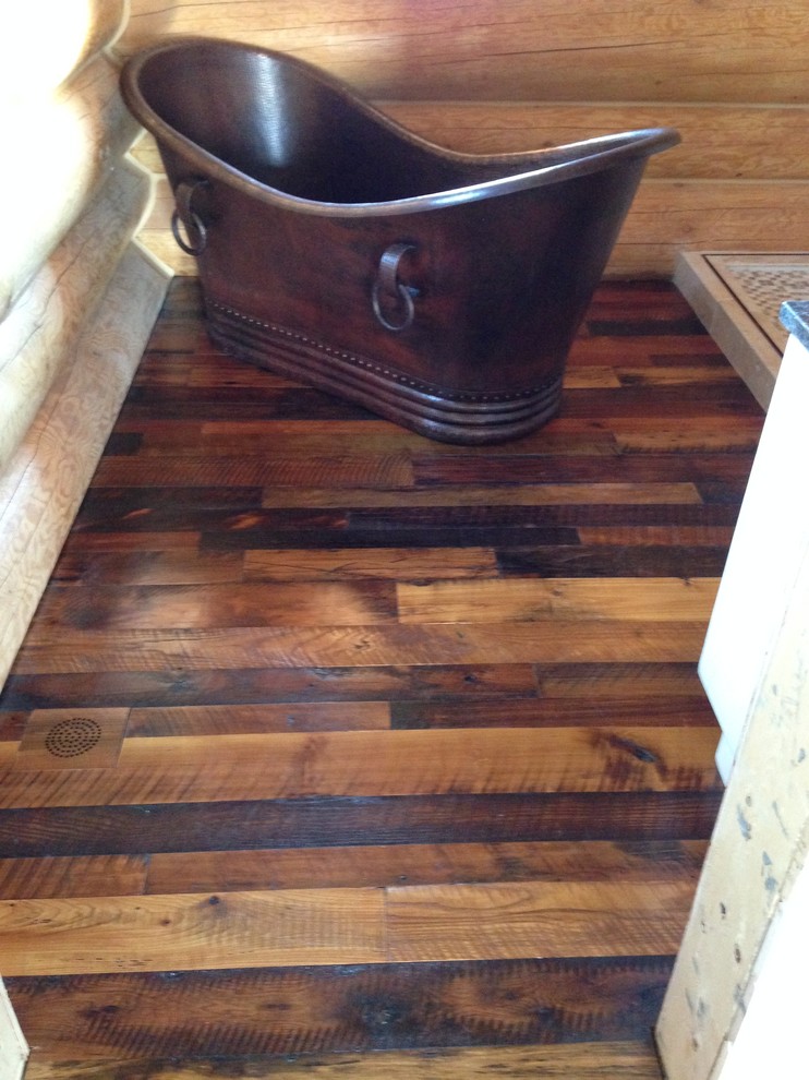 Inspiration for a country master bathroom in Vancouver with medium hardwood floors.