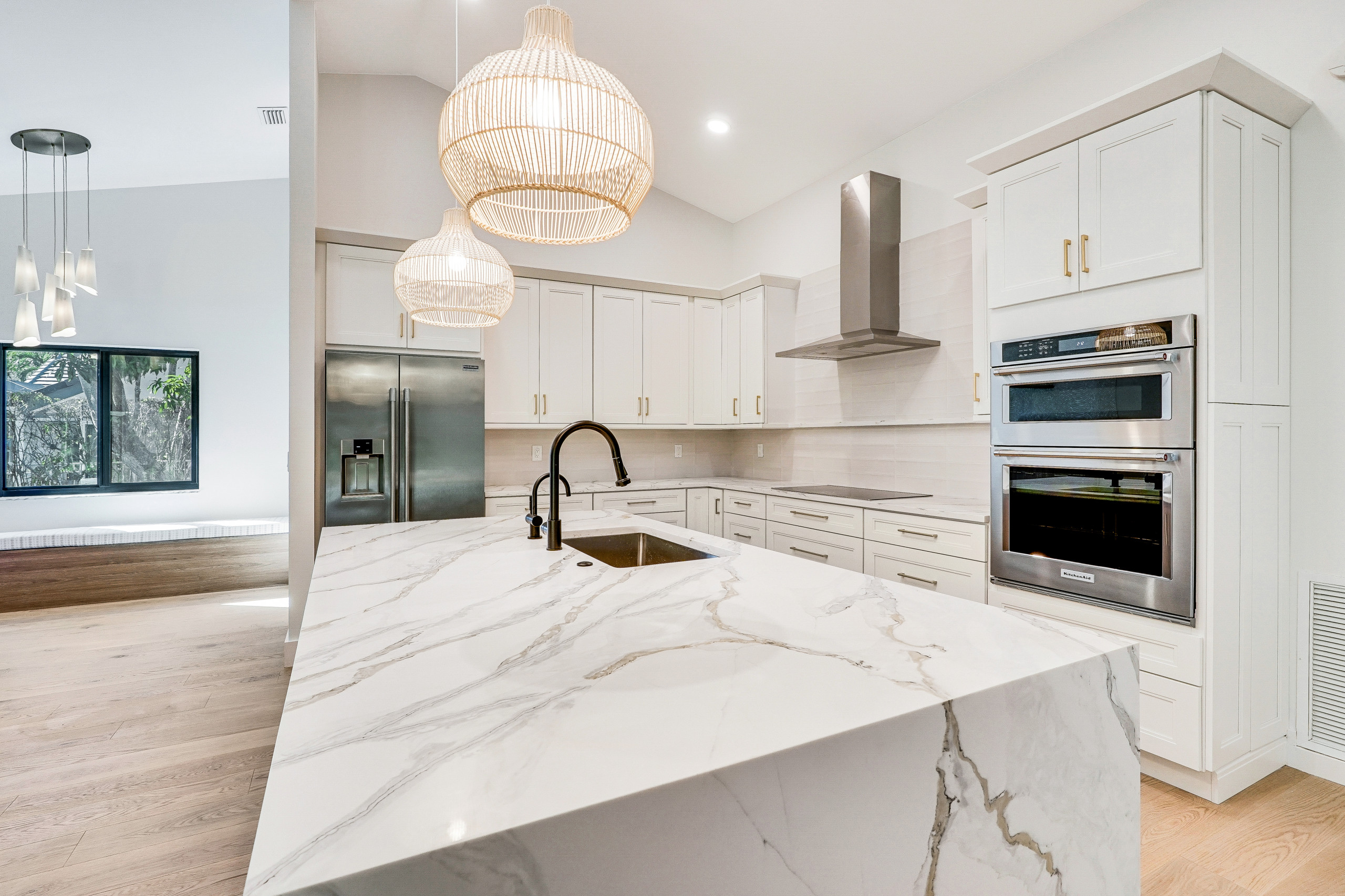 new kitchen with quartzite counters.  Basket weave lighting