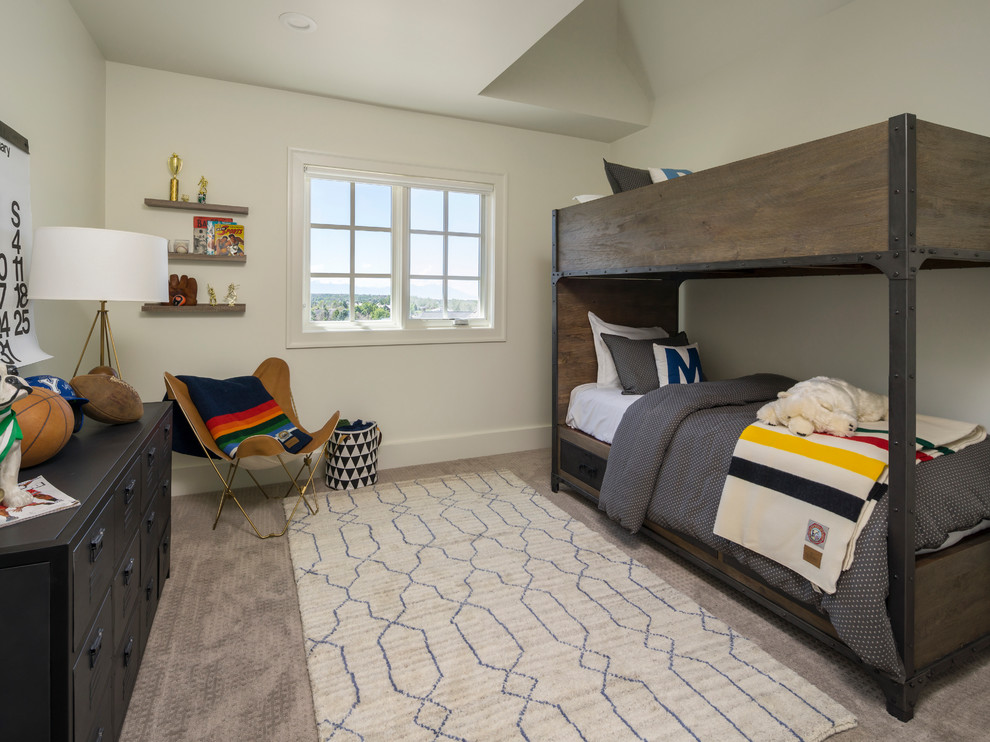 Design ideas for a transitional kids' bedroom for kids 4-10 years old and boys in Salt Lake City with white walls and carpet.