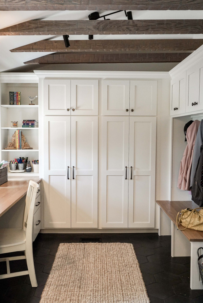 Inspiration for a small country mudroom in Other with white walls, ceramic floors, a single front door, a medium wood front door, grey floor, exposed beam and planked wall panelling.