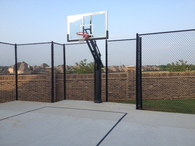 Design ideas for a large traditional backyard partial sun outdoor sport court in Dallas.