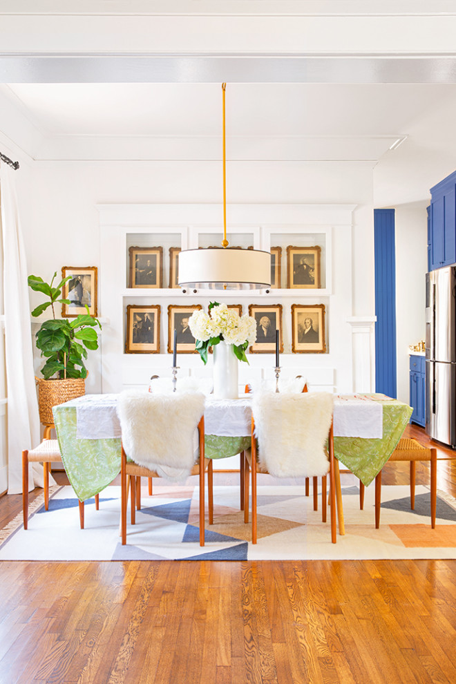 Mid-sized arts and crafts dark wood floor and brown floor great room photo in Los Angeles with white walls
