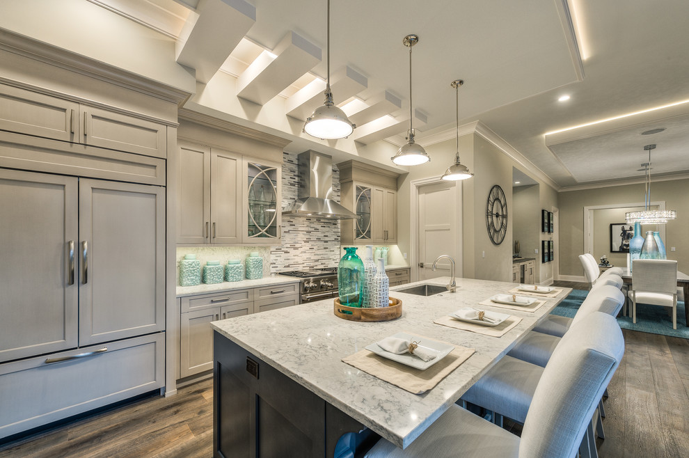 Example of a transitional home design design in Miami