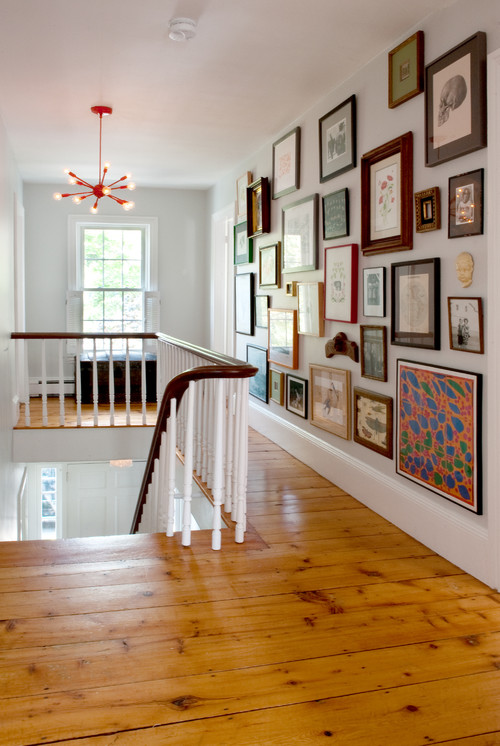 This is one of my favorite wall decoration ideas out there! Stunning gallery wall of family photos and art. 