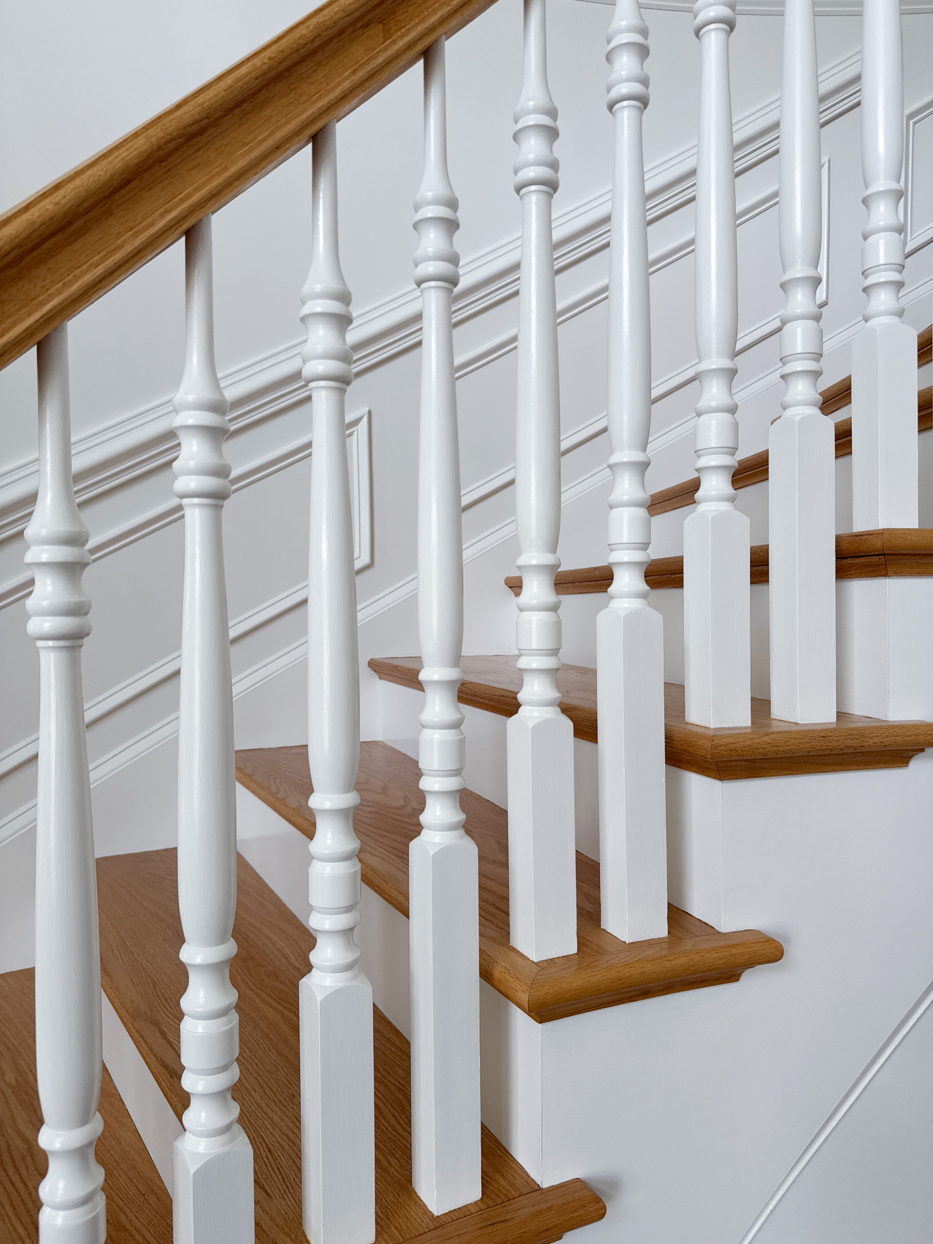 Project #161 | Curved Red Oak Foyer Staircase, 26 Years Later