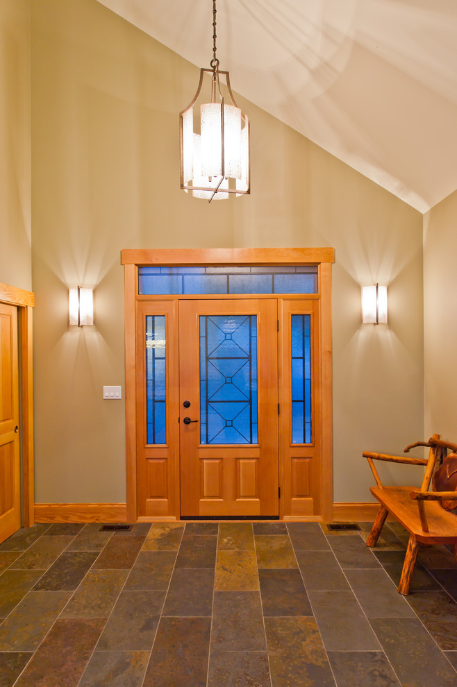Example of a mountain style entryway design in Vancouver