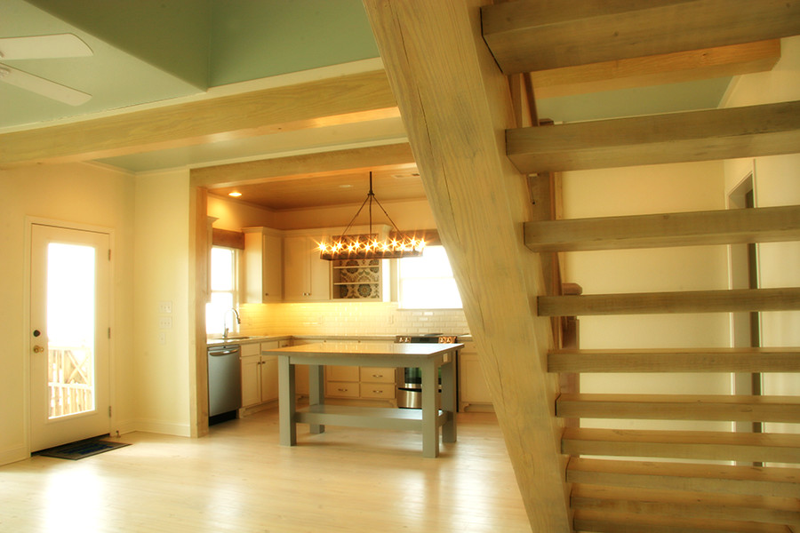 This is an example of a beach style staircase in Houston.