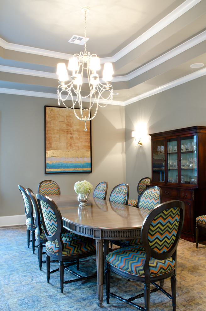 Inspiration for a large traditional separate dining room in Austin with beige walls and medium hardwood floors.