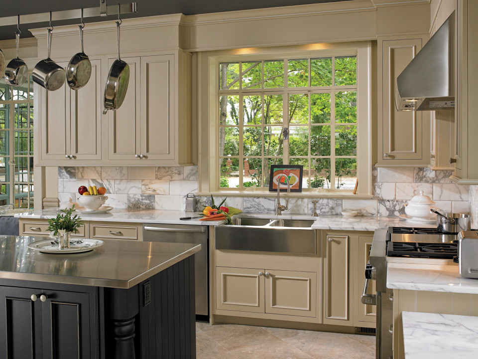 Example of a large transitional l-shaped porcelain tile and multicolored floor eat-in kitchen design with a farmhouse sink, beaded inset cabinets, beige cabinets, marble countertops, multicolored backsplash, marble backsplash, stainless steel appliances, an island and multicolored countertops