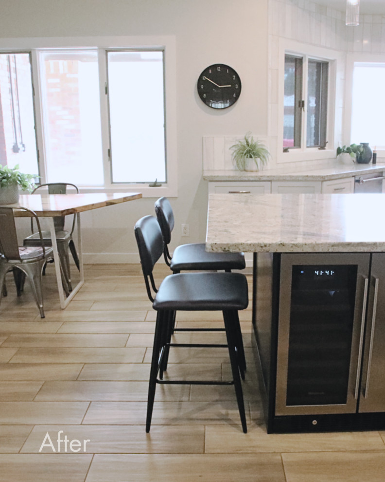 Example of a large transitional u-shaped ceramic tile and brown floor eat-in kitchen design in Phoenix with shaker cabinets, black cabinets, granite countertops, white backsplash, stainless steel appliances, an island and white countertops