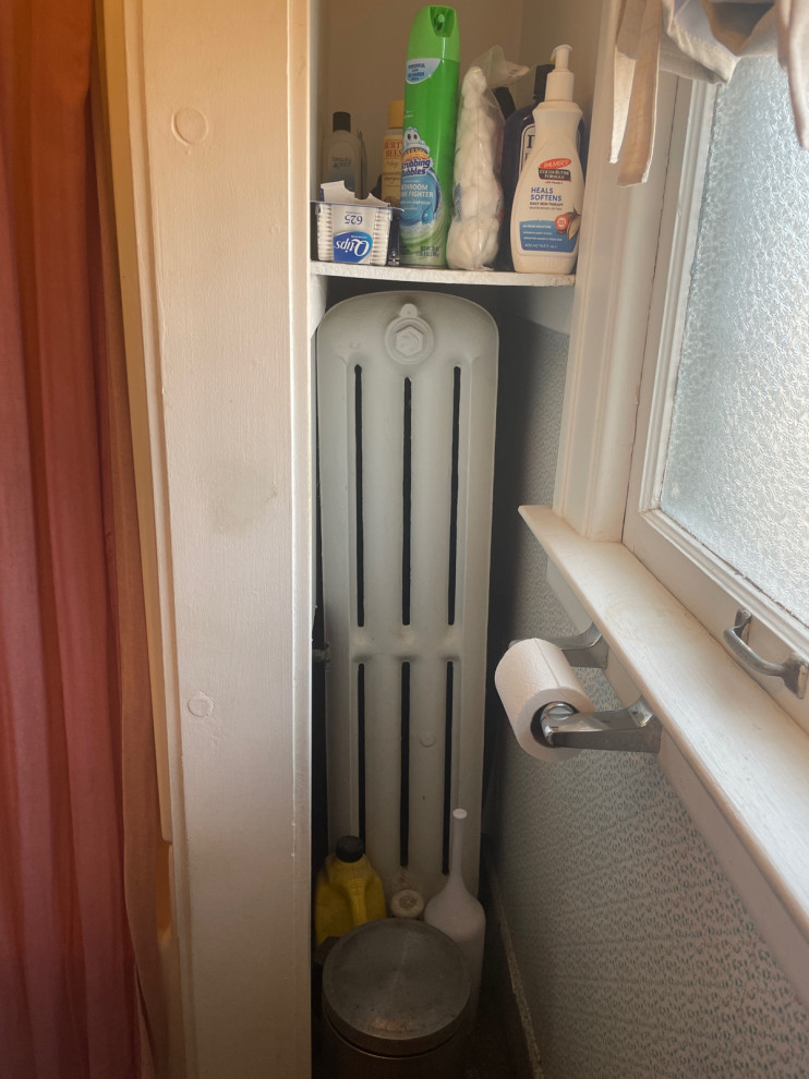 How to nicely fill gap between shower and wall?