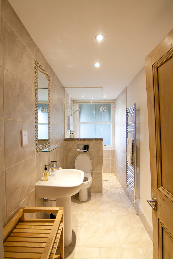 Photo of a contemporary bathroom in Edinburgh with an open shower, beige tile, beige walls and an open shower.
