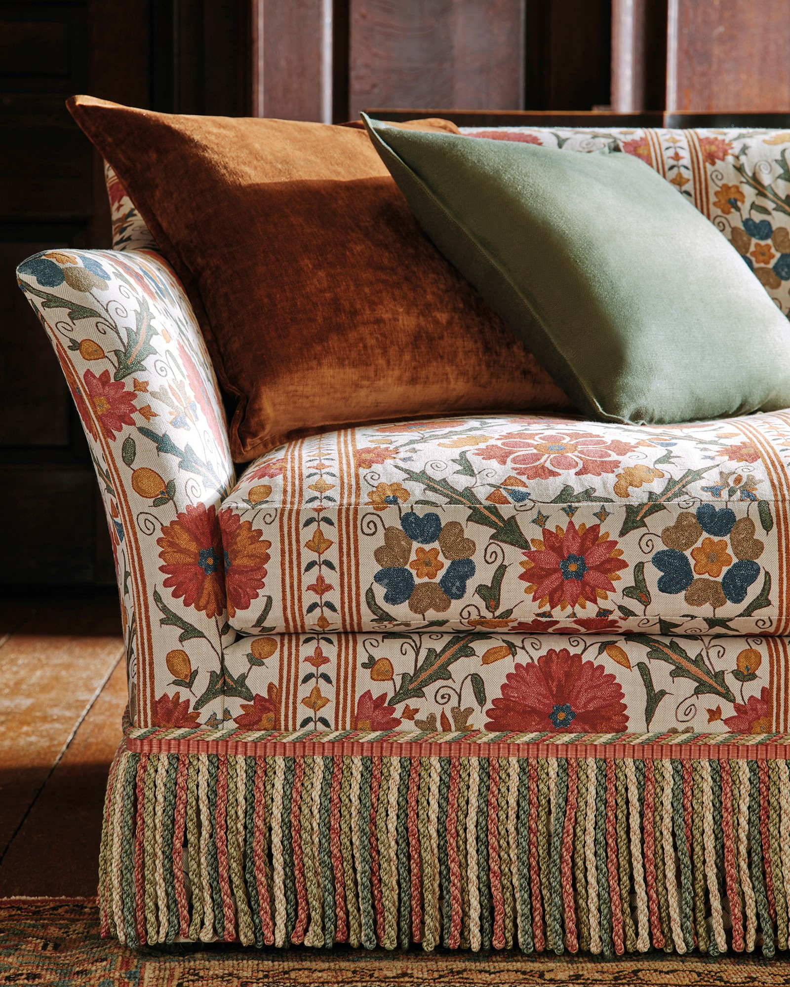 Buillon Fringe on Tamarind fabric by Colefax & Fowler