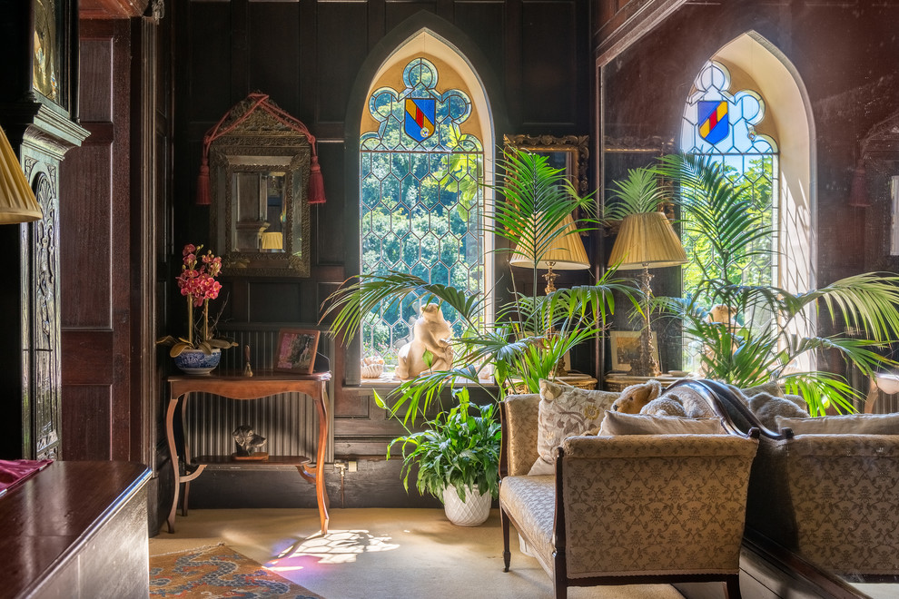 Inspiration for a large victorian entrance in Devon with white walls and a dark wood front door.