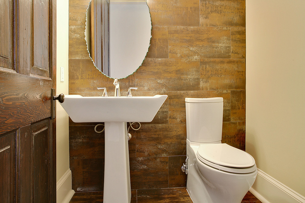 This is an example of a contemporary bathroom in New Orleans with stone tile.