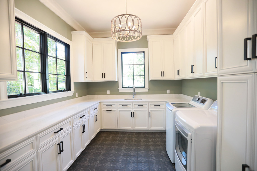 This is an example of a mid-sized modern u-shaped utility room in Charlotte with shaker cabinets, turquoise cabinets, green walls, ceramic floors, a side-by-side washer and dryer and vaulted.