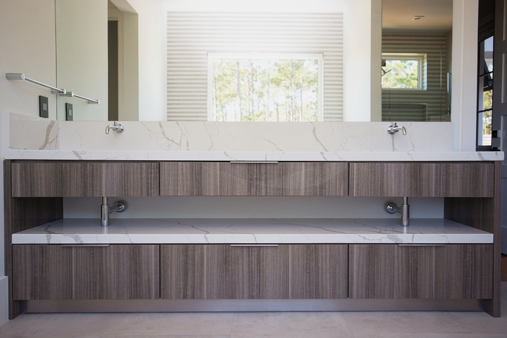 This is an example of a large modern master bathroom in Miami with flat-panel cabinets, brown cabinets, white walls, ceramic floors, a drop-in sink, quartzite benchtops, grey floor, white benchtops, a double vanity and a built-in vanity.