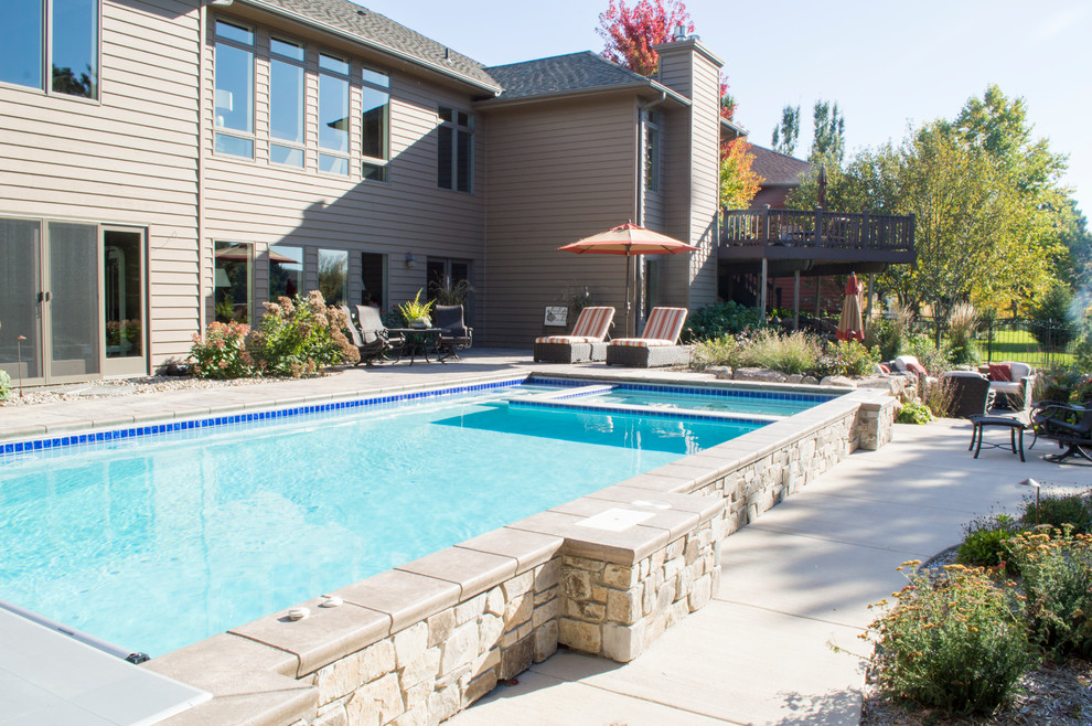 Inspiration for a backyard rectangular pool remodel