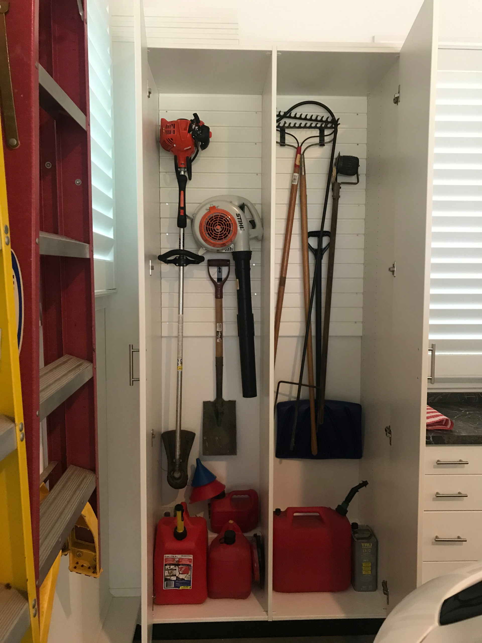 Garage with Cabinets & Slat Wall