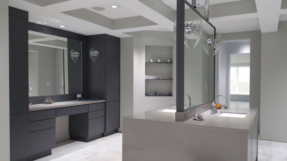 This is an example of a mid-sized modern kids bathroom in Miami with flat-panel cabinets, dark wood cabinets, a freestanding tub, white tile, porcelain tile and quartzite benchtops.