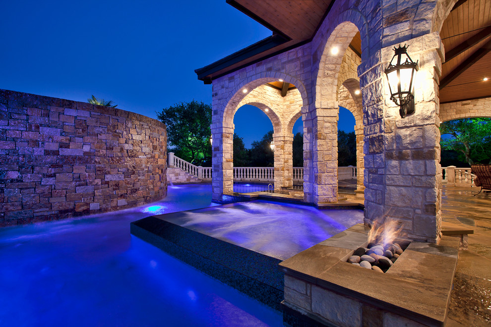 Inspiration for a mediterranean pool remodel in Austin