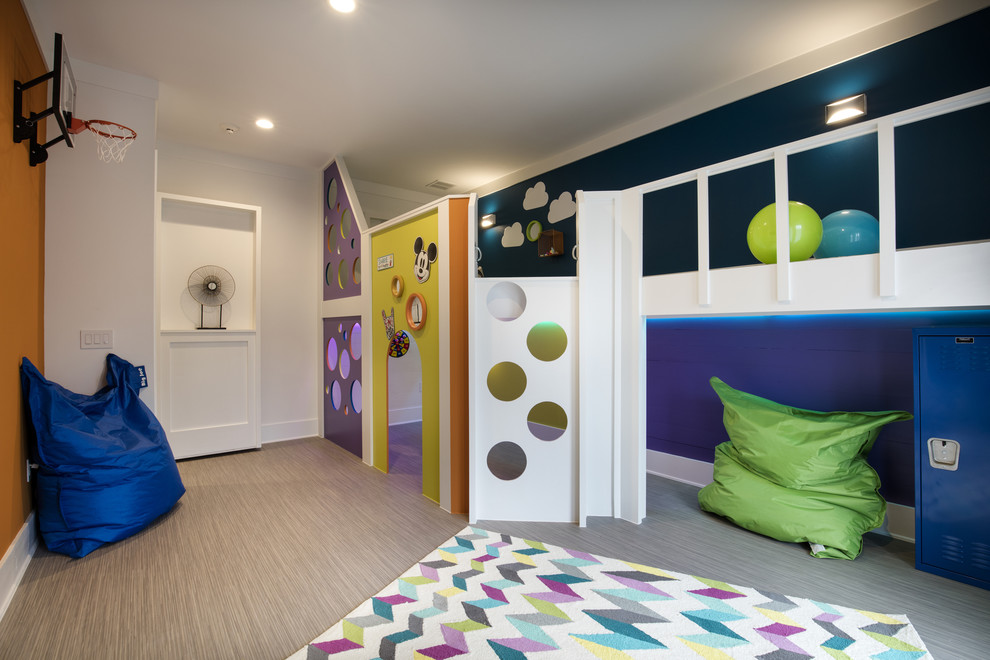 Inspiration for a mid-sized gender-neutral kids' playroom for kids 4-10 years old in Orlando with multi-coloured walls and vinyl floors.