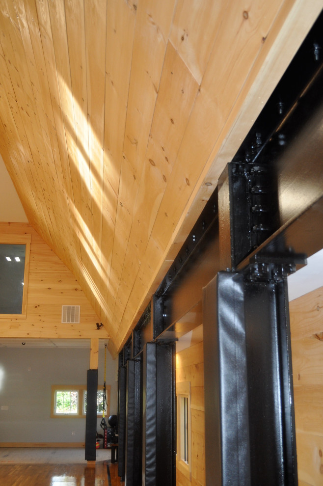 Example of a transitional home design design in Boston