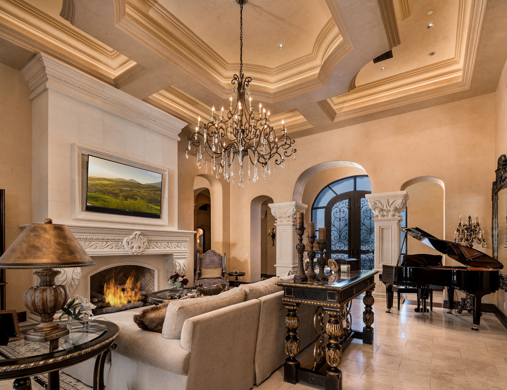 Design ideas for an expansive traditional open concept living room in Phoenix with a music area, beige walls, travertine floors, a standard fireplace, a stone fireplace surround, a wall-mounted tv and beige floor.