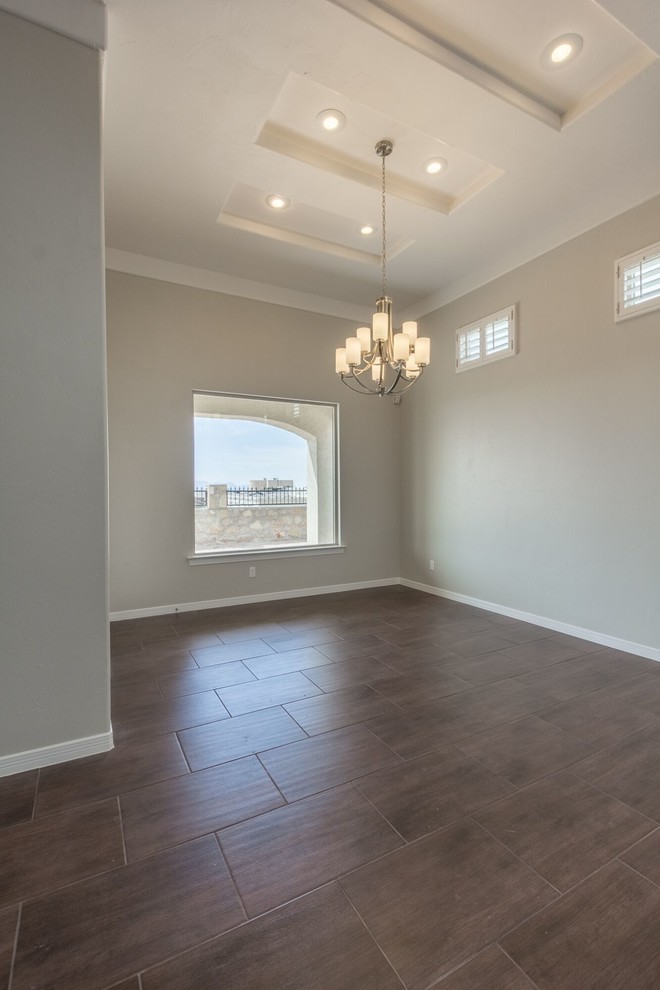 Inspiration for a large transitional ceramic tile home design remodel in Austin with gray walls