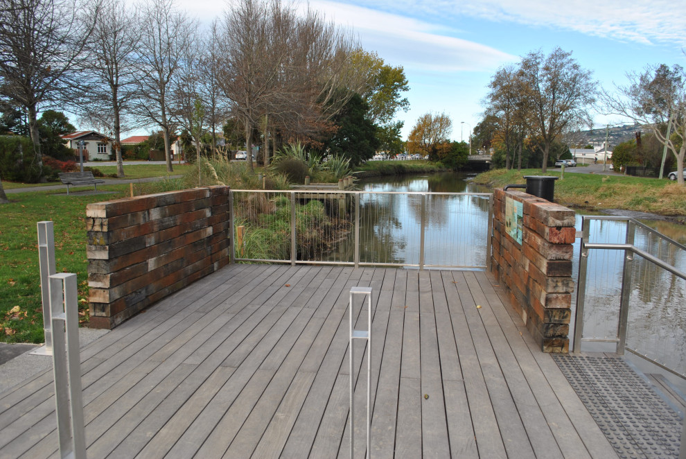 Inspiration for a mid-sized country sloped outdoor sport court in Christchurch with with pond.