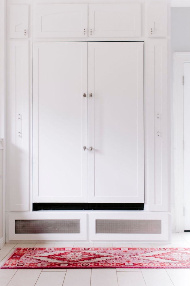 Example of a large transitional home design design