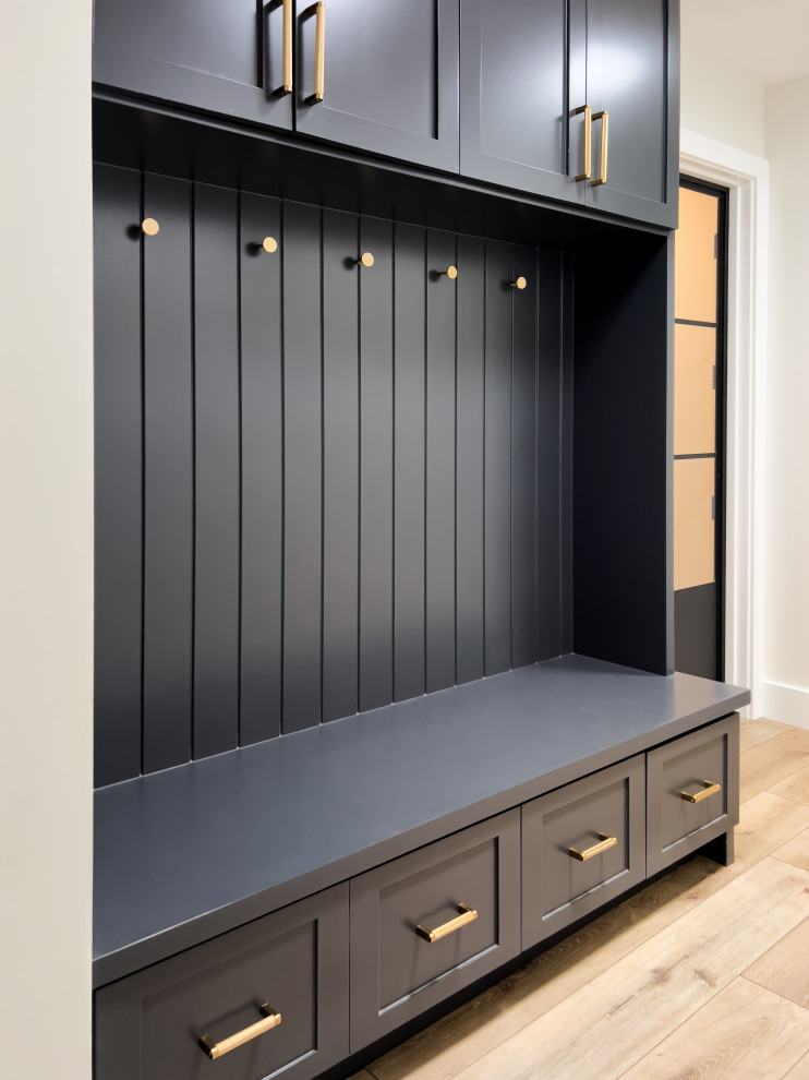 Entryway - mid-sized modern entryway idea in Orange County with white walls
