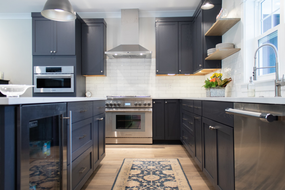 Example of a transitional kitchen design in Grand Rapids
