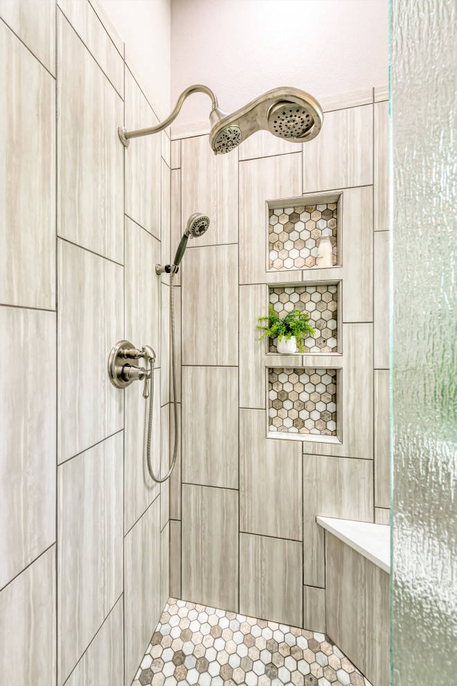 Example of a mid-sized transitional master beige tile and porcelain tile porcelain tile and gray floor freestanding bathtub design with raised-panel cabinets, white cabinets, a one-piece toilet, beige walls, an undermount sink, quartzite countertops, a hinged shower door and white countertops