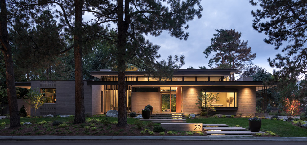 Inspiration for a mid-sized contemporary exterior home remodel in Denver
