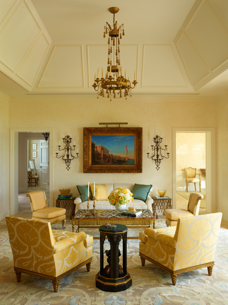 Design ideas for a traditional living room in New York with yellow walls, light hardwood floors and beige floor.