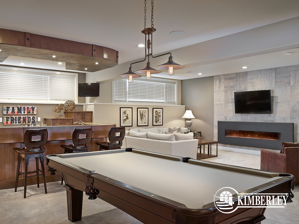 Inspiration for a transitional open concept family room in Edmonton with a home bar, beige walls, carpet, a stone fireplace surround and a wall-mounted tv.