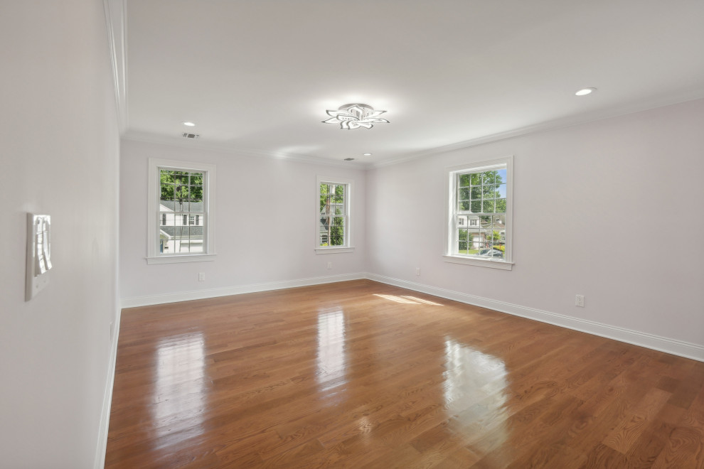 Bedroom with Sloped Ceiling and Closet Wall