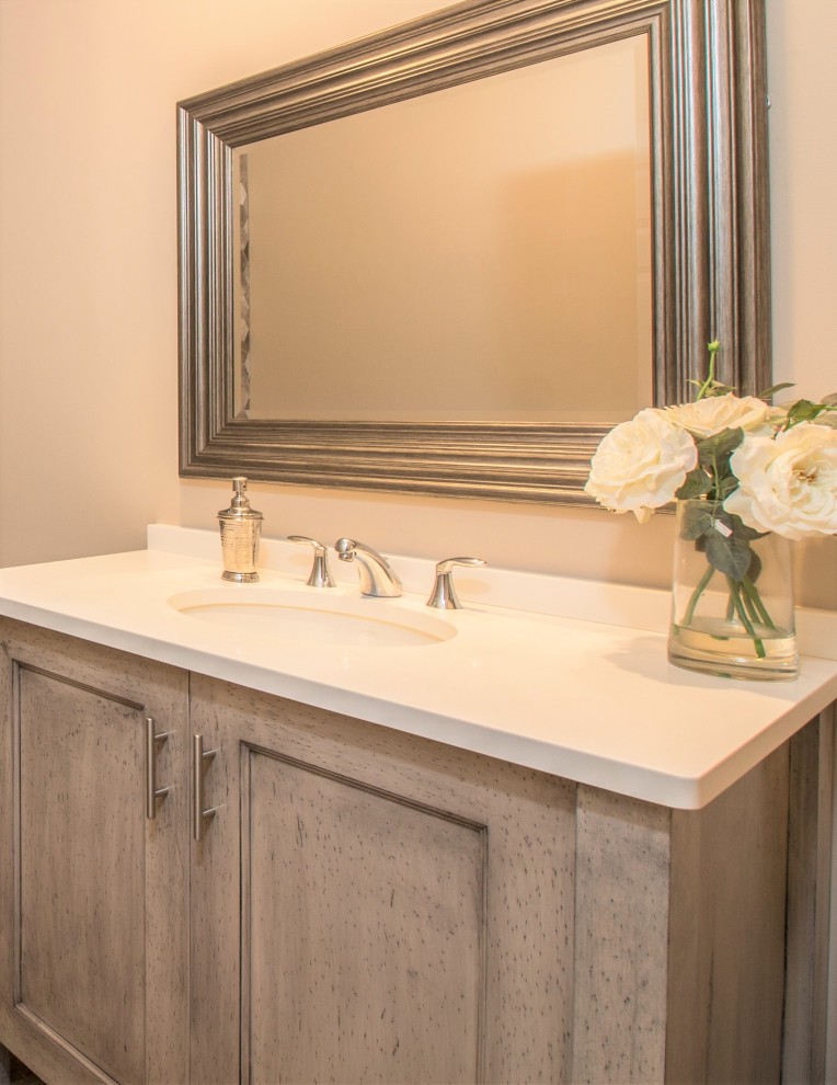 Photo of a mid-sized transitional master bathroom in Boston with shaker cabinets, light wood cabinets, wood-look tile, an undermount sink, engineered quartz benchtops, brown floor, white benchtops, a single vanity and a freestanding vanity.