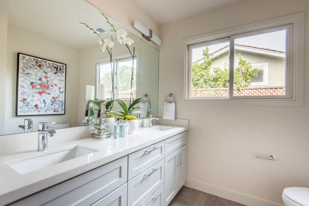 Design ideas for a large transitional master bathroom in San Francisco with shaker cabinets, grey cabinets, a double shower, a one-piece toilet, multi-coloured tile, porcelain tile, grey walls, porcelain floors, an undermount sink and engineered quartz benchtops.