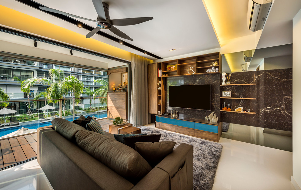 Design ideas for a small contemporary open concept living room in Singapore with multi-coloured walls, no fireplace and a built-in media wall.