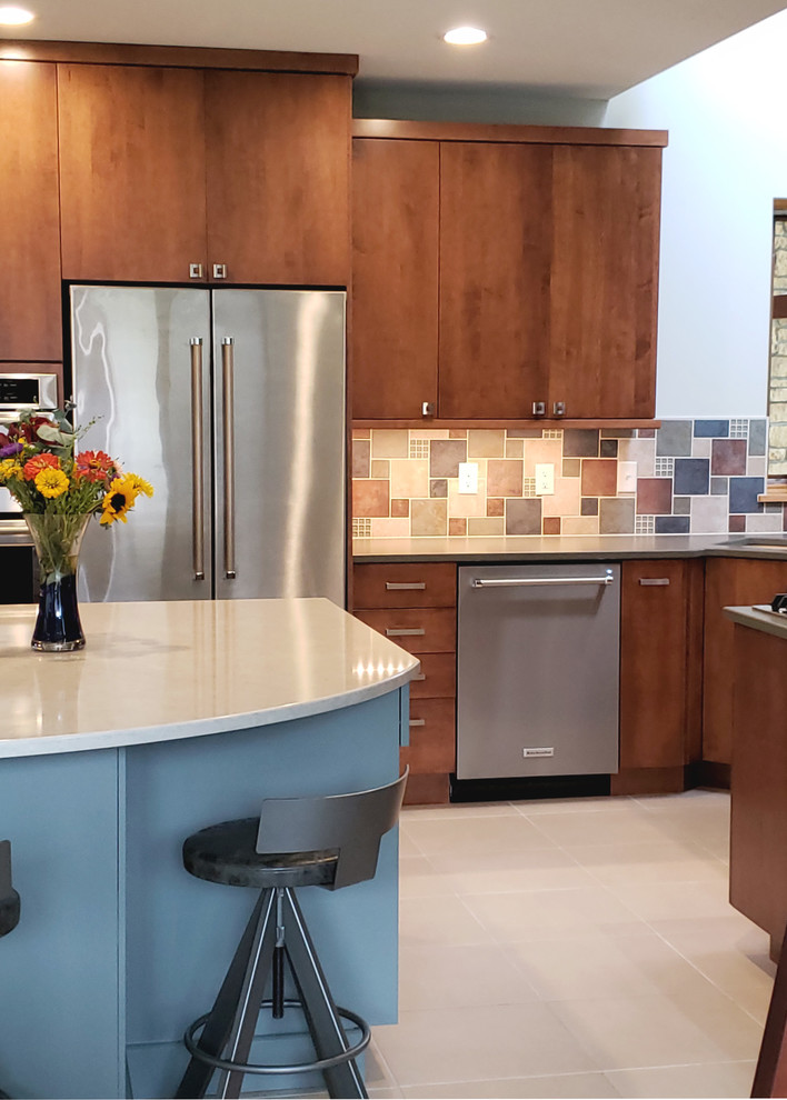 Photo of a mid-sized modern u-shaped eat-in kitchen in Other with an undermount sink, flat-panel cabinets, medium wood cabinets, quartz benchtops, multi-coloured splashback, slate splashback, stainless steel appliances, concrete floors, with island, grey floor and grey benchtop.