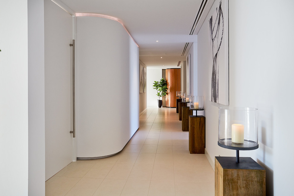 This is an example of a large contemporary hallway in Perth with white walls.