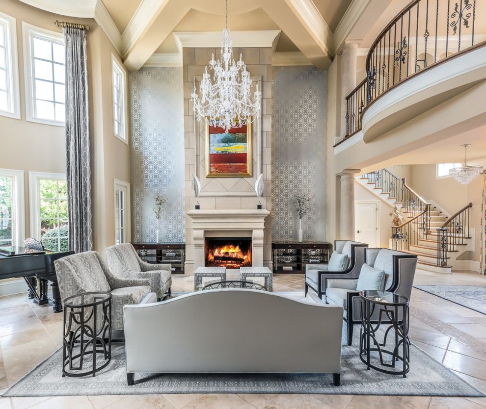 This is an example of an expansive traditional formal open concept living room in Charlotte with beige walls, no tv and a standard fireplace.