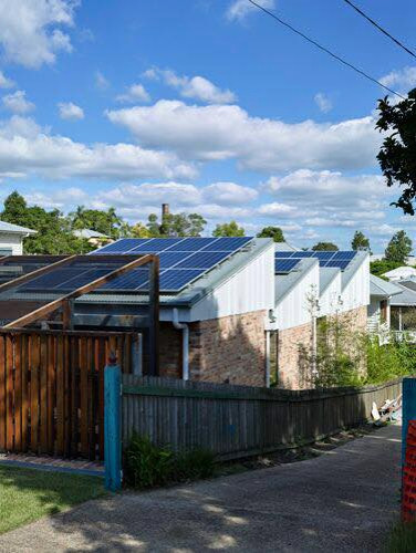 Saw tooth roof to maximise solar panels and improve air flow in the house